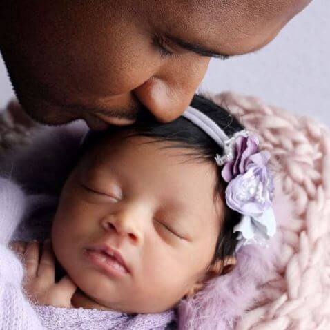 Usher Cinco Raymond V's Father, Usher, and half-sister, Sovereign Bo Raymond.